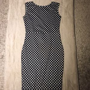 Sleeveless polka dot midi dress with open back
